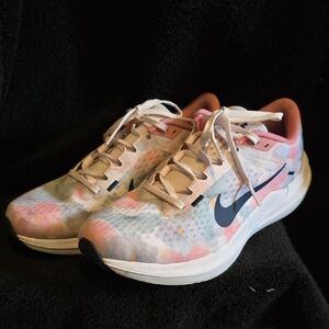 Nike Pink and Blue Athletic Shoes with Artistic Design